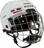 A white CCM hockey helmet with a silver cage is shown from a side angle against a white background. Náhľad obrázku produktu