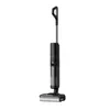 A black and gray wet and dry vacuum cleaner is shown against a white background. Produktbild-Vorschau