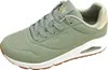 A studio shot of a single green Skechers sneaker. Produktbild-Vorschau