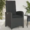 An outdoor chair with cushions on a patio. Náhľad obrázku produktu