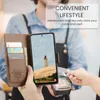 A person is holding a brown leather phone case with a phone inside, and another person is using a payment terminal. Produktbild-Vorschau