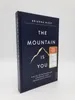 A book titled "The Mountain Is You" by Brianna Wiest is shown against a white background. Náhľad obrázku produktu