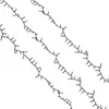 Three diagonal strands of Christmas lights on a white background. Produktbild-Vorschau