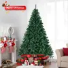 A decorated Christmas tree with presents underneath, next to a fireplace with stockings. Podgląd zdjęcia produktu