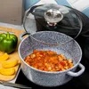 A close-up shot of a gray speckled pot with food inside, sitting on a stovetop. A green bell pepper and some orange slices are on a wooden cutting board to the left. A glass lid is partially covering the pot. Produktbild-Vorschau