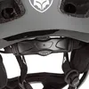 A close-up view of the interior adjustment mechanism of a bicycle helmet. Podgląd zdjęcia produktu