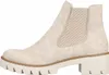 A side view of a beige Chelsea boot with a thick white sole. Voir les images du produit