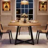 A dining table set up for a meal with chairs around it, in a well-lit room with a large window. Produktbild-Vorschau