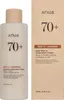 A bottle of Anua Rice 70 + Ceramide Glow Milky Toner and its packaging are shown side-by-side against a white background. Náhľad obrázku produktu