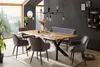 A dining room scene with a wooden table, chairs, and a bench, set against a dark wall and a large window with a scenic view. Produktbild-Vorschau