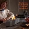 People toasting marshmallows over a tabletop fireplace. Podgląd zdjęcia produktu