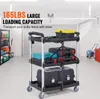 A multi-shelf rolling cart filled with toolboxes and storage containers in a garage setting. Voir les images du produit