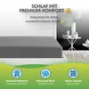 A close-up view of a grey fitted sheet on a bed, with marketing text and icons below. Produktbild-Vorschau