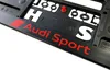 A close-up, angled shot of an Audi Sport license plate frame. Náhľad obrázku produktu