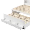 A white wooden bed frame with an open drawer and a slatted mattress base. Produktbild-Vorschau