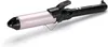 A professional studio shot of a curling iron on a white background. Anteprima dell’immagine prodotto