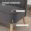 Close-up of a dark gray sofa with wooden legs, highlighting comfort features. Produktbild-Vorschau