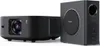 A black projector and a black speaker are shown side-by-side on a white background. Anteprima dell’immagine prodotto