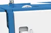 A close-up view of a white and blue sewing machine, focusing on the top controls and a small opening on the side. Produktbild-Vorschau