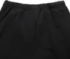 Close-up of the waistband of black sweatpants. Podgląd zdjęcia produktu