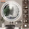 A modern bathroom with a round LED mirror, sink, and faucet. Podgląd zdjęcia produktu