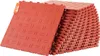 A stack of red interlocking garage floor tiles, with one tile angled in the foreground. Voir les images du produit