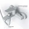 A white bathroom faucet mounted on a wall, with dimensions indicated by text and lines. Produktbild-Vorschau