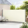 A patio scene with outdoor furniture and a retractable side awning. Podgląd zdjęcia produktu