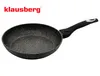A black frying pan with a speckled granite-like interior and a black handle is shown against a white background. The brand name 'klausberg' is visible in red text in the upper left corner. Anteprima dell’immagine prodotto