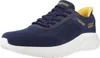 A single navy blue Skechers sneaker with yellow accents is shown against a white background. Voir les images du produit