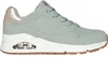 A side view of a green Skechers sneaker with a gold accent on the heel. Produktbild-Vorschau