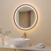 A modern bathroom vanity with a round LED mirror above a vessel sink. Produktbild-Vorschau