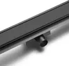 A close-up, studio shot of a black linear shower drain with a visible outlet pipe. Podgląd zdjęcia produktu