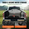 A black water storage bladder is placed in the bed of a white pickup truck, with a scenic outdoor background. Podgląd zdjęcia produktu