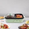 A multi-functional electric hot pot and grill with food items on a table. Produktbild-Vorschau