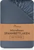 A folded fitted sheet with a brown paper band around it, displaying product information. Produktbild-Vorschau