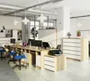 An office environment with desks, chairs, and computers. Produktbild-Vorschau