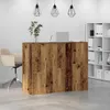 A reception desk in an office setting with a chair and shelving unit. Produktbild-Vorschau