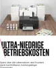 A printer with stacks of paper and ink bottles, with marketing text below. Produktbild-Vorschau