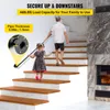 A man and a child are walking up a staircase, with the man holding onto a black handrail. The handrail is attached to the wall with a circular flange. There is a fireplace on the right side of the image. Anteprima dell’immagine prodotto
