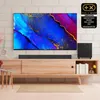 A modern living room setup with a TV, soundbar, and subwoofer on a wooden media console. Produktbild-Vorschau