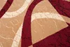 A close-up view of a carpet with a modern abstract pattern. Náhled obrázku produktu