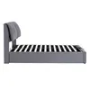 A side view of a gray upholstered bed frame with a slatted mattress base. Náhled obrázku produktu