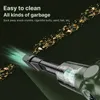 A close-up of a handheld vacuum cleaner nozzle sucking up debris, with text overlay highlighting its cleaning capabilities. Produktbild-Vorschau