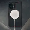 A black leather iPhone case with red stitching is shown with a white MagSafe charger attached. Produktbild-Vorschau