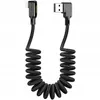 A black coiled charging cable with a 90-degree Lightning connector on one end and a USB-A connector on the other. Anteprima dell’immagine prodotto
