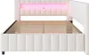 A side view of a beige upholstered bed frame with a pink LED light illuminating the headboard. Náhled obrázku produktu