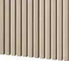 A close-up view of vertical wooden slats arranged side-by-side, creating a textured wall paneling effect. Náhľad obrázku produktu
