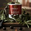 Latrovalis Schwarze Oliven mit Stein 810 g auf Holz mit Olivenzweigen Produktbild-Vorschau