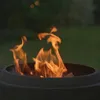 A close-up shot of a LANDMANN fire pit with flames burning. Anteprima dell’immagine prodotto
